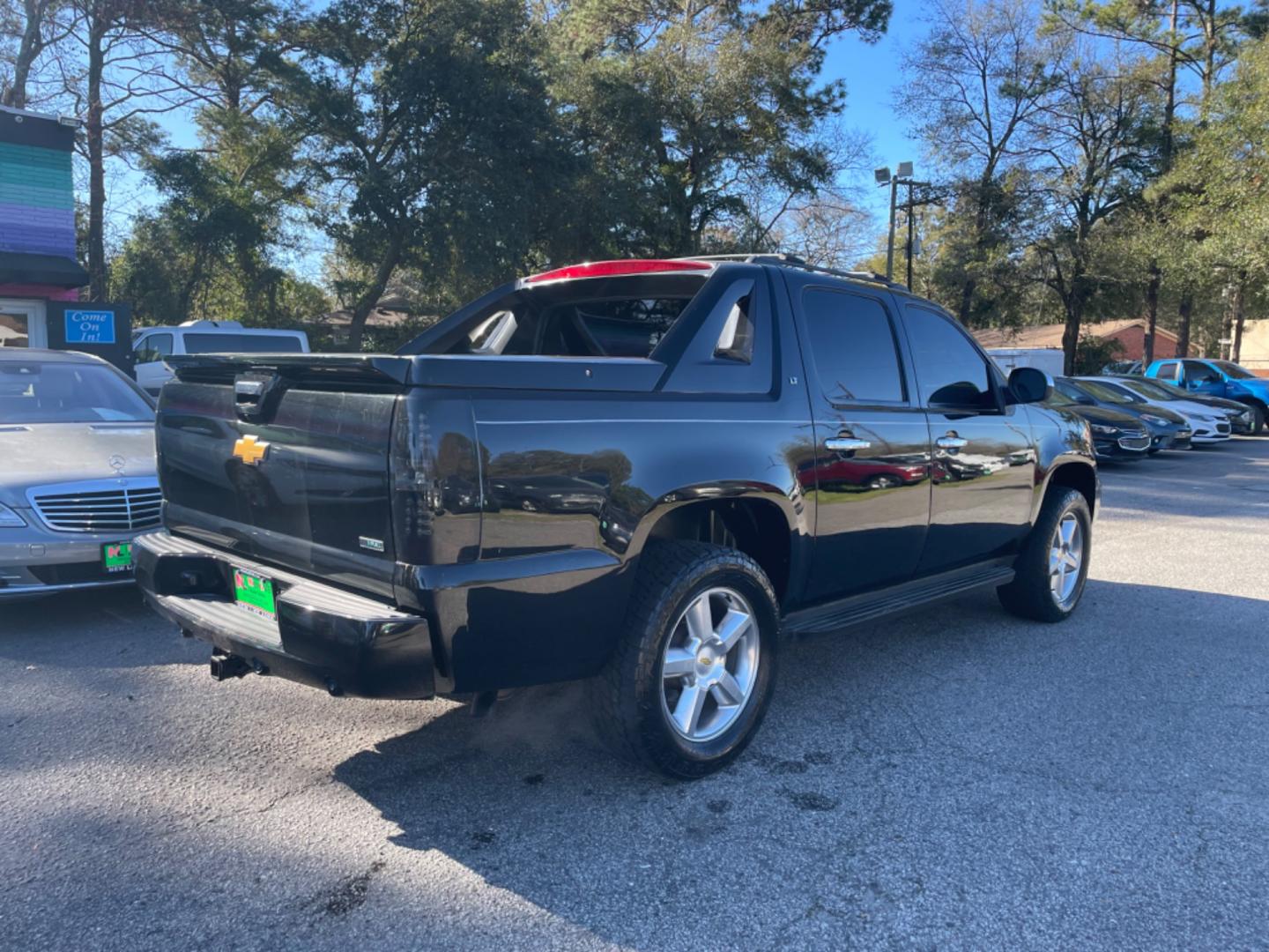 2011 BLACK CHEVROLET AVALANCHE LT (3GNMCFE09BG) with an 5.3L engine, Automatic transmission, located at 5103 Dorchester Rd., Charleston, SC, 29418-5607, (843) 767-1122, 36.245171, -115.228050 - Leather, CD/AUX/Sat, backup Camera, Dual Climate Control, Power Everything (windows, locks, seats, mirrors), All-weather Mats, Keyless Entry, Running Boards, Tow Package, Alloy Wheels. 174k miles Located at New Life Auto Sales! 2023 WINNER for Post & Courier's Charleston's Choice Pre-owned Car Deal - Photo#6